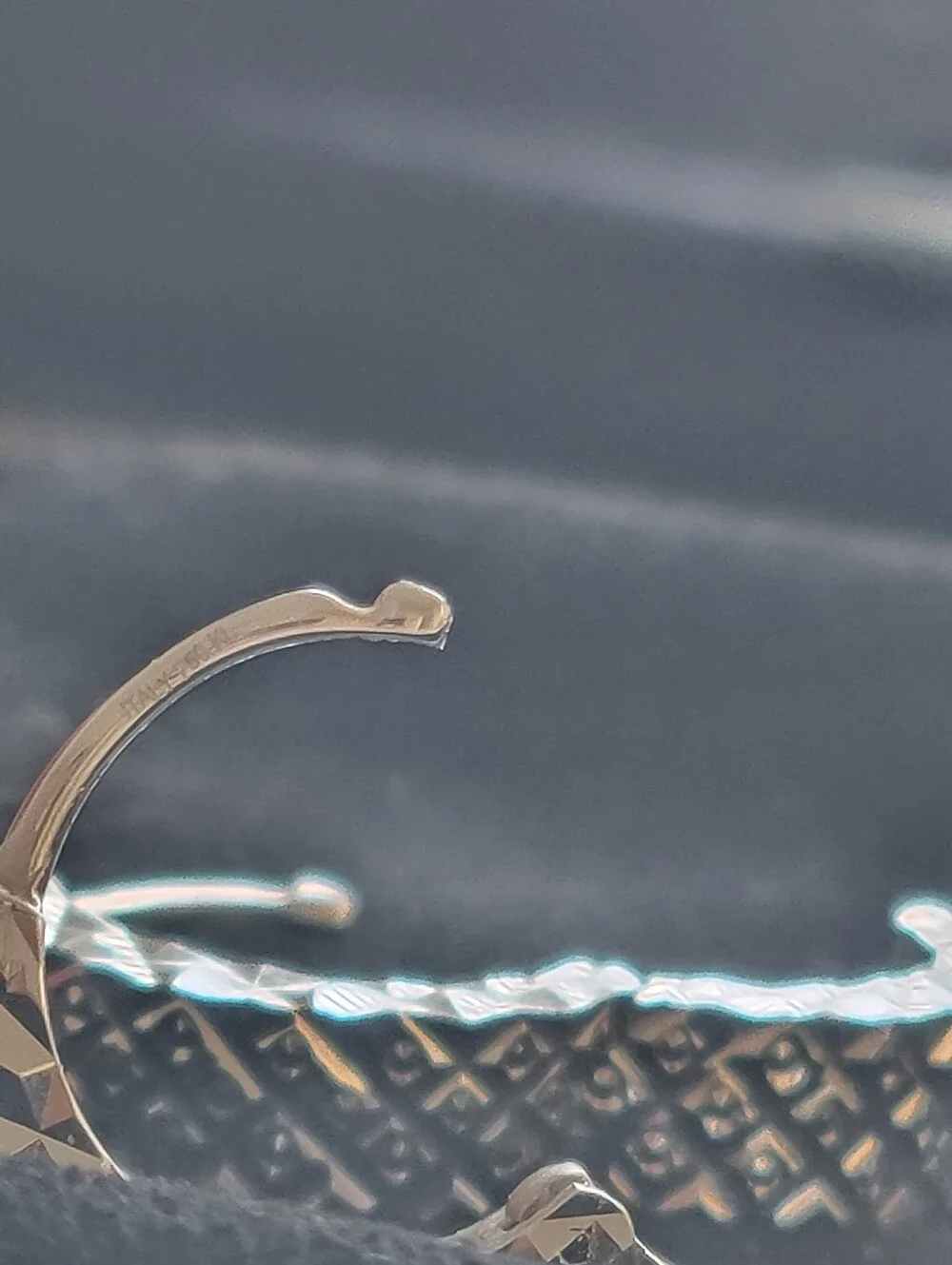 18 KT White Gold Diamond Cut Infinity Earrings